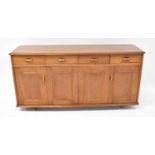 A mid-20th century oak sideboard, comprising four short drawers over two pairs of cupboard doors,