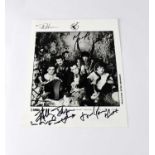 FRANKIE GOES TO HOLLYWOOD; a black and white promotional photograph signed by Trevor Horn and