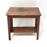 A mahogany side table with rectangular plank top, above square legs with turned supports and an