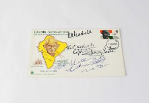 NELSON MANDELA; a first day cover bearing the signatures of Nelson Mandela, Jimmy Carter and Desmond