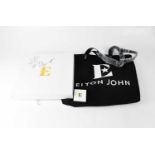 ELTON JOHN; 'Goodbye Yellow Brick Road' tour memorabilia, signed gift pack containing notebook,