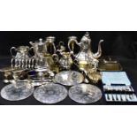 Various items of silver plate, to include a three-piece tea set, toast rack, two-branch epergne, hot