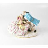 MEISSEN; a porcelain figure group of a couple with child, the lady seated on a Rococo-style chair