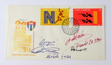 CUBAN POLITICS; a first day cover bearing the signatures of Fidel Castro, and Alberto Korda (