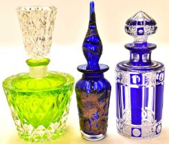 Three art glass perfume decanters, one with green and clear body, height 17cm, one with blue and