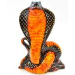 ANITA HARRIS POTTERY; a painted pottery figure of a cobra, height 21cm, signed underneath in gold,
