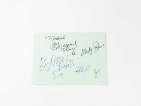 MARC BOLAN; a torn page from an autograph album bearing the signatures of Marc Bolan, Bill Legend,