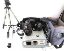 A large quantity of photographic equipment and accessories, to include a Canon E250 8mm video