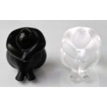 LALIQUE; a pair of seated figures, titled 'Statuette Nu Nabhi' and 'Stauette Nu Nabhi Noir', both in