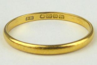 A 22ct gold thin band ring, size R, approx. 1.95g.