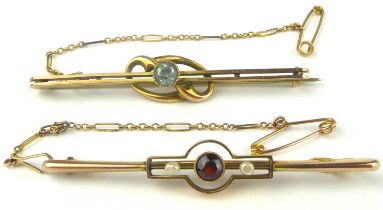 Two 9ct gold bar brooches, one a bezel set light blue stone in a split bar, length 5.5cm, the