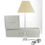 DANIEL SWAROVSKI; a boxed 'Luxor' table lamp and separate Swarovski brown fabric lampshade, height