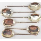 ERNEST J. LOWE; a set of six George V hallmarked silver sorbet spoons, with engraved initials to the
