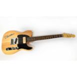 FENDER; a Blonde Telecaster Cadillac electric guitar.