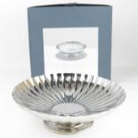 GEORG JENSEN; a stainless steel dish on stand from the 'Bernadotte' collection, from the 'Living'