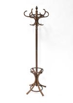 A bentwood hatstand, with six scrolling hooks to the upper section, height 188cm (af). Condition