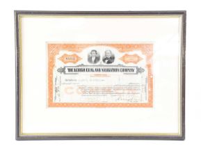 Two tiny framed financial documents, comprising a bond from the Chinese Government, numbered with