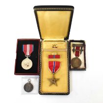 Four medals comprising the Queen's Diamond Jubilee Medal 1952-2012, in original box, the King's