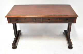 A Victorian rosewood side table/desk with leather insert top, two frieze drawers above stile