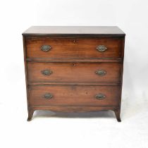 An Edwardian mahogany chest of three long drawers, raised on outswept bracket feet, 87.5 x 91.5 x