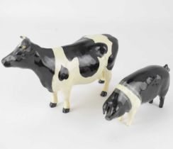 BESWICK; two porcelain model figures, comprising 'Friesian cow Ch. Claybury Leegwater' 1362A and '