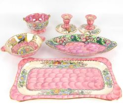 MALING; five items of 'Peony Rose' pattern pottery, comprising a pair of short candlesticks,
