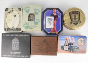 ZIPPO; seven collectors' edition lighters, presentation tins, wooden box, outer cardboard box, to