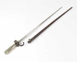 An M1895 pattern French spike bayonet with hooked quillon, stamped '87925', with further