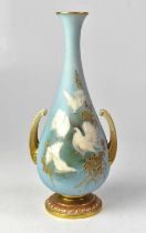 ROYAL WORCESTER; a blue ground and gilt-heightened vase hand painted with doves to the front and