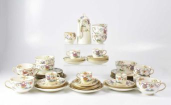 ROYAL WORCESTER; an Oriental-style floral tea service, with black back stamp, registered design