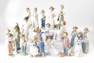 NAO; twenty figures of children in various outfits, height of largest 26cm (20). Condition Report: