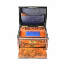 A Victorian walnut work box, the lid with inset brass plaque inscribed with initials, enclosing a