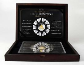 'The Heraldry of the Coronation Silver Coin Set 1953-2013', issued by Westminster Mint, encapsulated