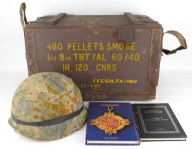 Military collectibles to include a hard hat with camouflage covering and internal webbing, unmarked,