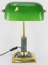 A modern reproduction desk lamp with green shade and brass and green marbled body, height 38cm.