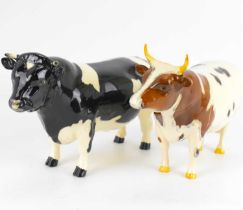 BESWICK; a 'Friesian Bull Ch. 'Coddington Hill Bar'' model no.1439A, together with an 'Ayrshire Bull