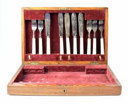 GOLDSMITHS & SILVERSMITHS COMPANY LTD; an oak cased part canteen of silver plated cutlery, with