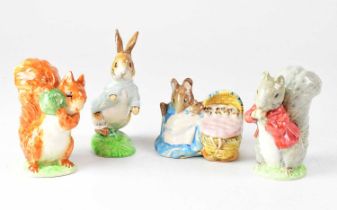 BESWICK; four Beatrix Potter figures comprising 'Squirrel Nutkin', 'Peter Rabbit', 'Timmy Tiptoes'