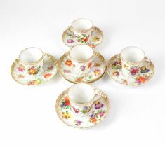 DRESDEN; a gilt-heightened floral part tea service, comprising five cups and six saucers (11).