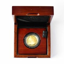 A quarter ounce gold proof coin 'The Britannia 2016', issued by the Royal Mint, encapsulated and