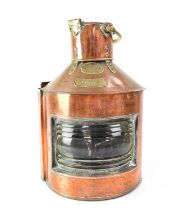 A brass ship's lantern by Telford, Greer & Mackay Ltd of Glasgow, with brass plaque inscribed '