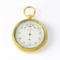 A compensated brass pocket barometer with silvered dial, made in England, diameter 5.6cm, within a