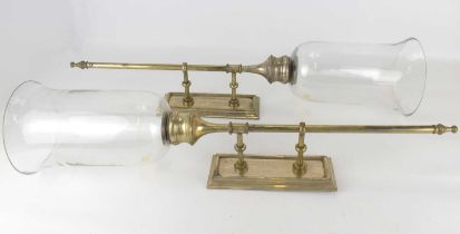 A pair of modern reproduction silver plated interior wall lights with large glass balls, internal