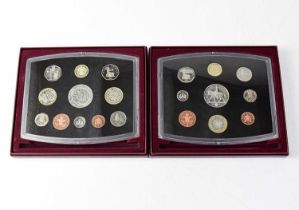 Four cased sets of United Kingdom proof coins, limited editions issued by Royal Mint with