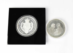 A 'Royal Mint 5 Ounce Silver Proof Sapphire Jubilee Coin 2017', encapsulated, in box, together