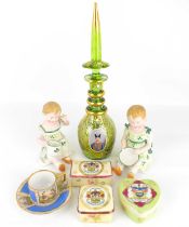 A 19th century Bohemian green glass decanter with pointed stopper, decorated with two printed