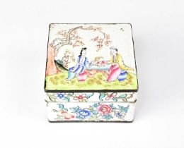 A Chinese enamelled metal square box painted with figures picnicking in a cherry blossom