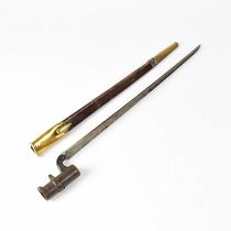 A Martini Henry .577/450 socket bayonet with brass bound leather scabbard, length of the tri-blade