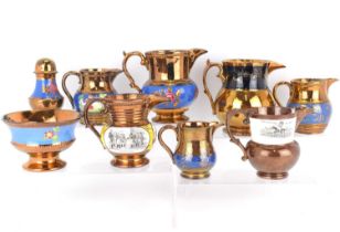 Nine items of Victorian copper lustre ware, to include a small commemorative jug with panels