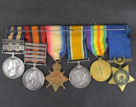 A six-medal group comprising a Victoria Egypt Medal with two clasps, Suakin 1885, and Tamaai, a